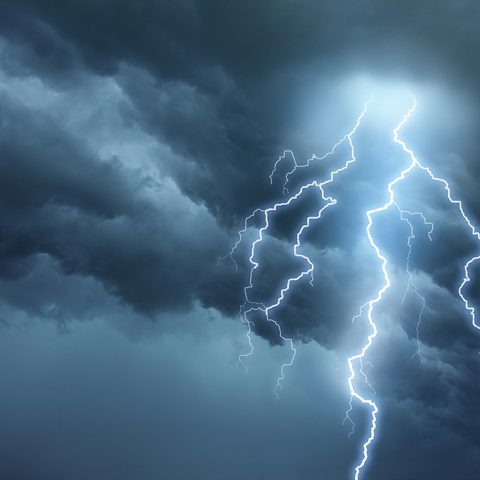 Thunderstorm lightning with dark cloudy sky